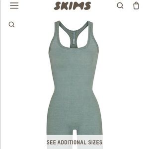 Skims mid thigh outdoor bodysuit Medium size